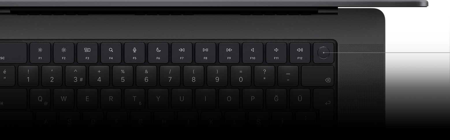 Magic Keyboard üzerindeki Touch ID tuşunu gösteren imleç