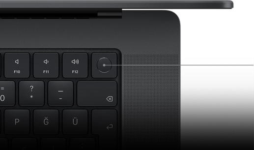Magic Keyboard üzerindeki Touch ID tuşunu gösteren imleç.